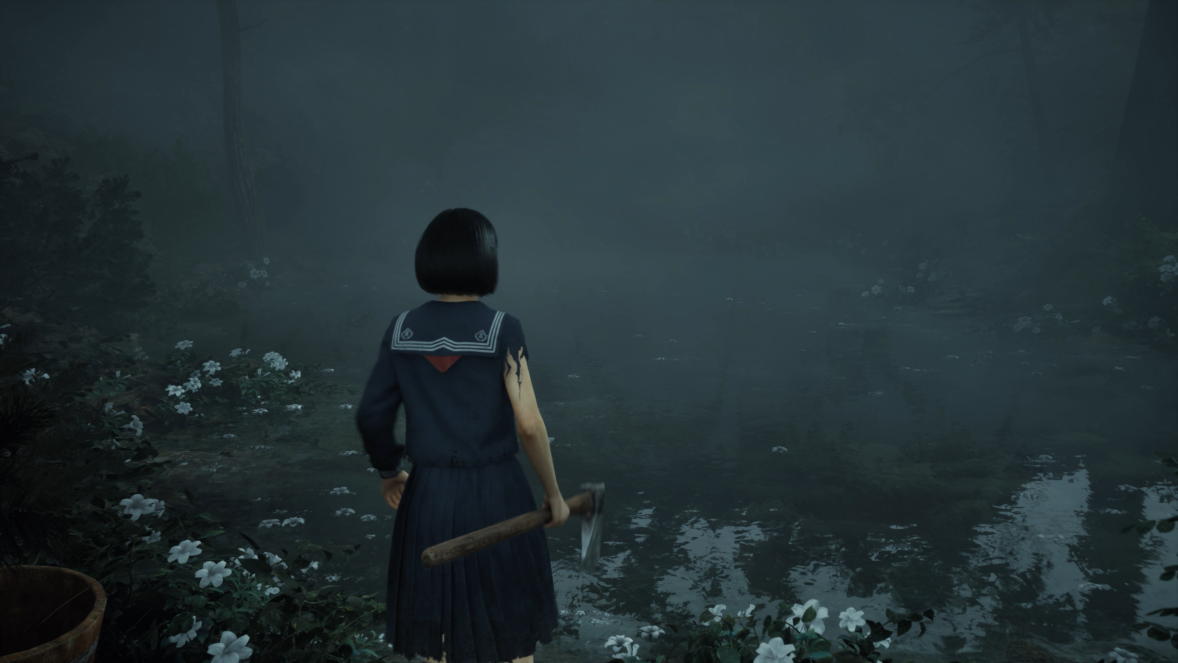 Hinako looks at a pond surrounded by white flowers in Silent Hill f.